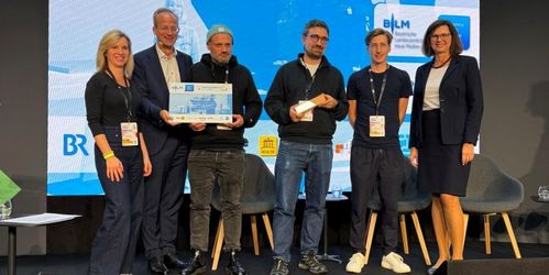 Preisträger auf Bühne bei MTM25